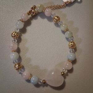 Elegant Gold and Pink Heart Bracelet